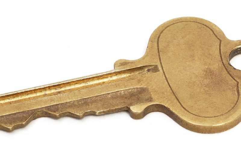 Brass house key