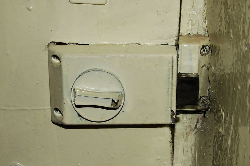 Rim lock fitted to a timber door